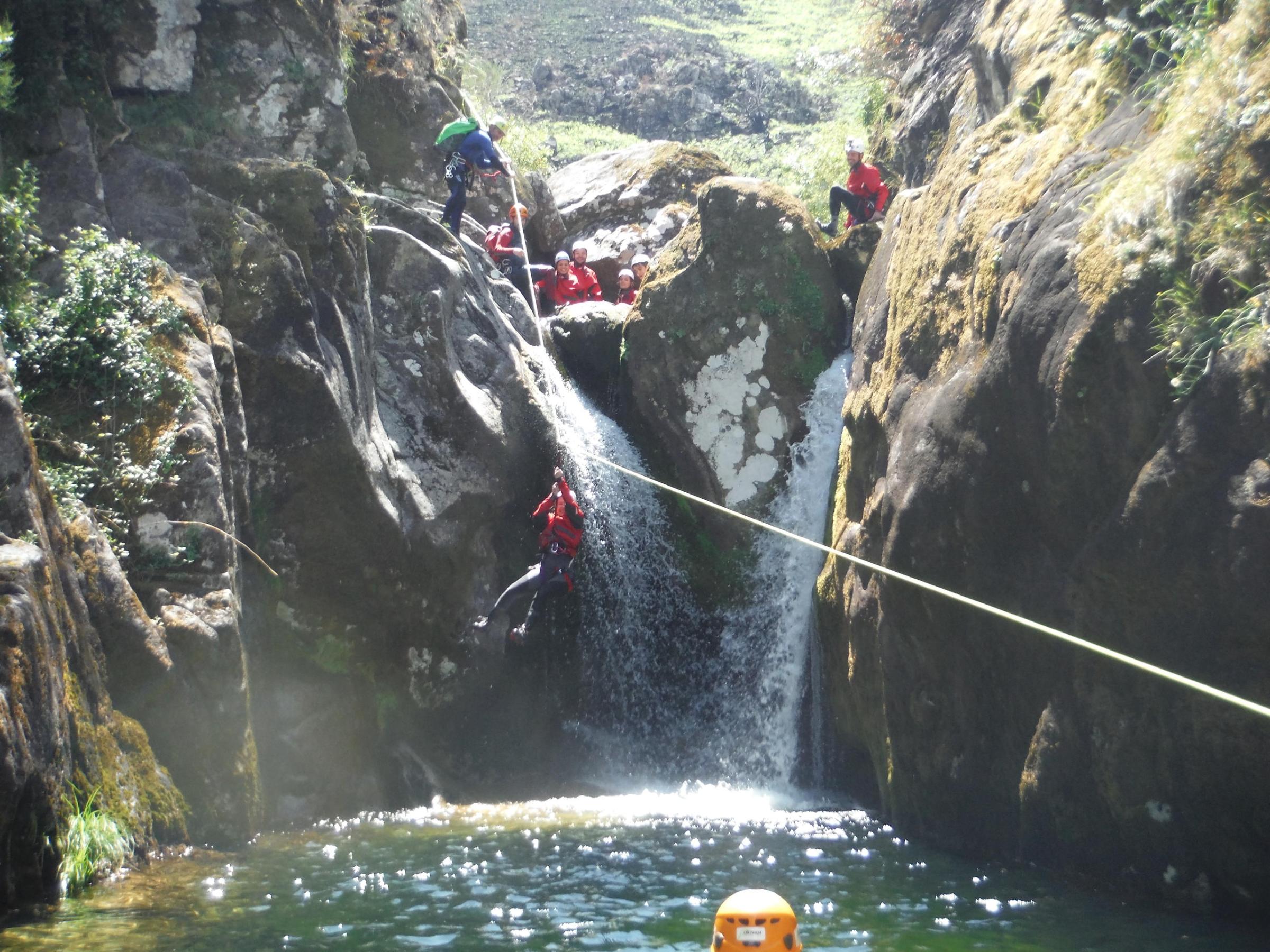 Group of people doing canoying